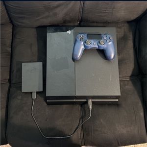 PlayStation 4 included with storage drive and controller